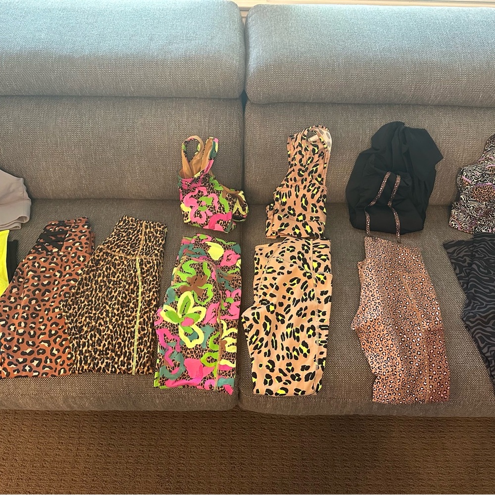 Fabletics Colorful Patterned Workout Leggings and Sport Bras Sets.